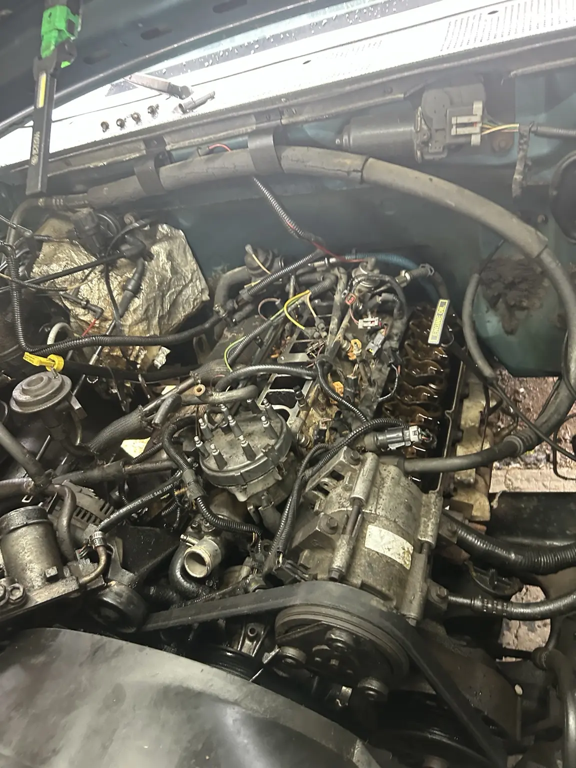 Vehicle engine bay during a valve job.